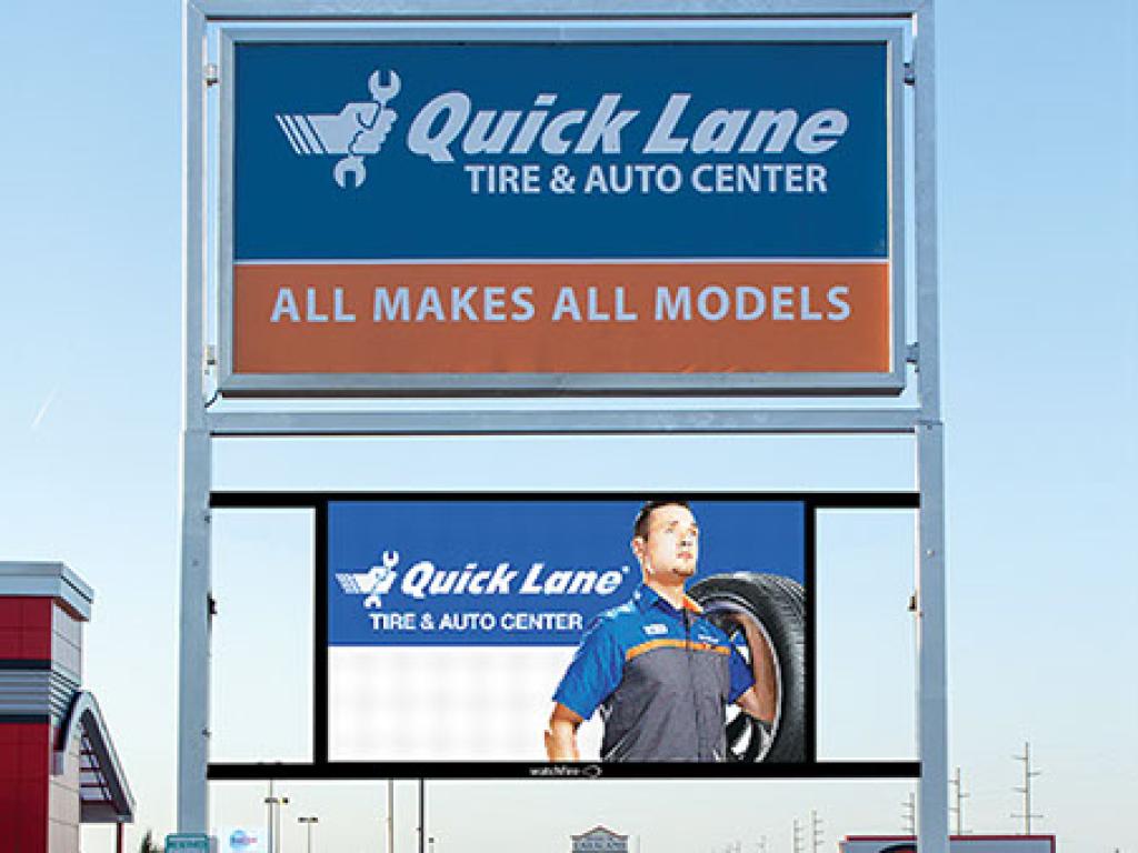 Double pole pylon sign with LED screen