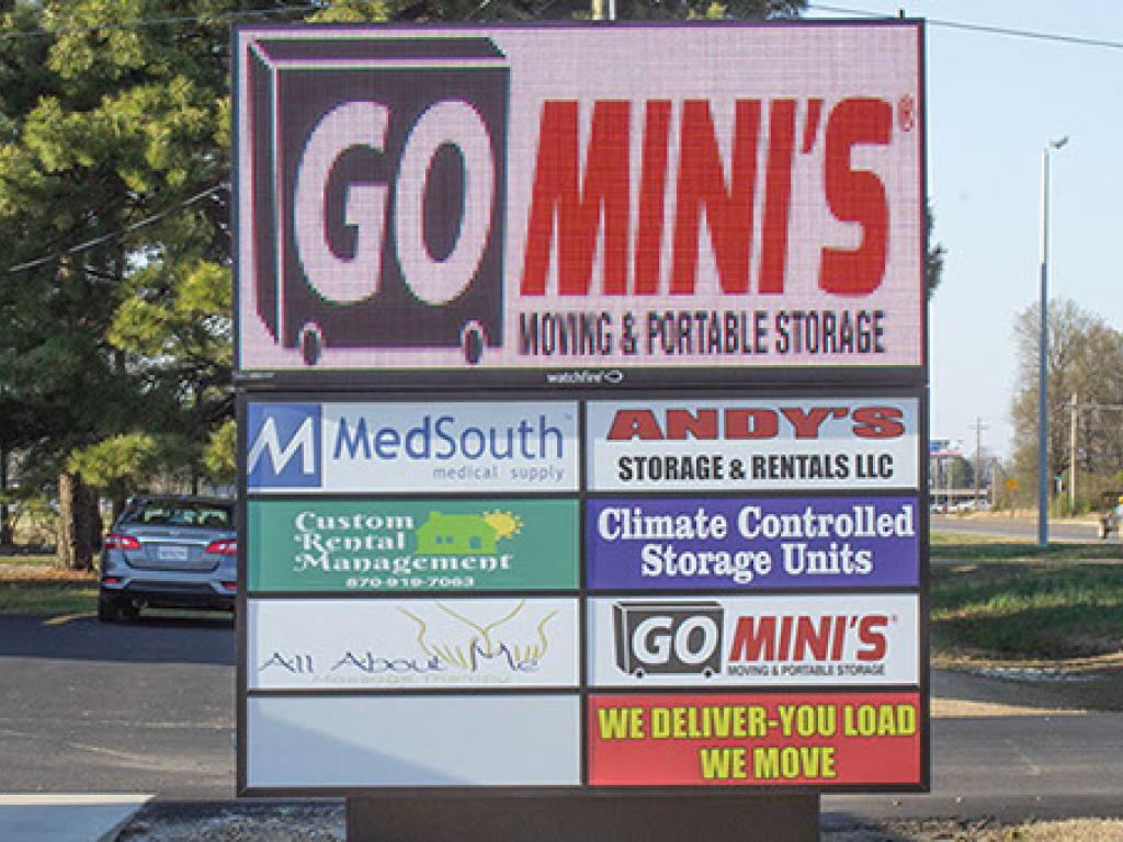 Multi-business pylon sign with an LED sign mounted on top